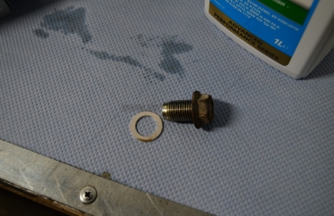 Новая прокладка сливной пробки