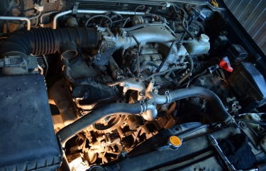 Мицубиси Паджеро 4 замена ремня ГРМ (подробные фото)